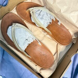 OluKai Women's Brown and Pale Gold Sandals